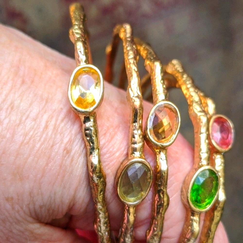 Set of gold plated  bracelets with colored stones